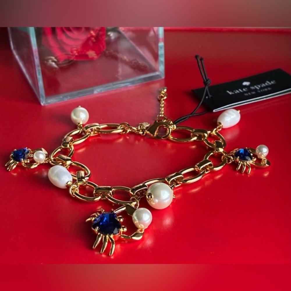 kate spade Gold-Tone Bracelet with Blue Crystal and Pearl Charms